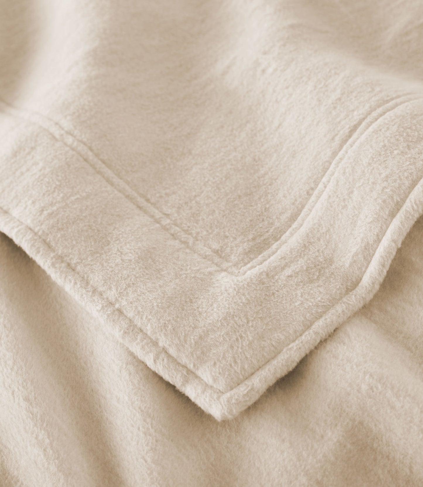 Close up of framing detail of All Seasons Framed Cotton Blanket, Linen