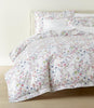 chloe percale duvet and sham on a bed in a cream colored room, Floral