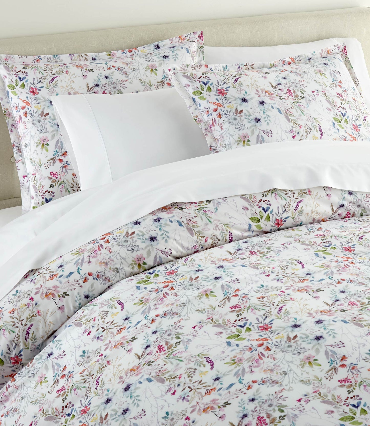 chloe percale duvet and sham on a bed with a cream colored headboard, Floral