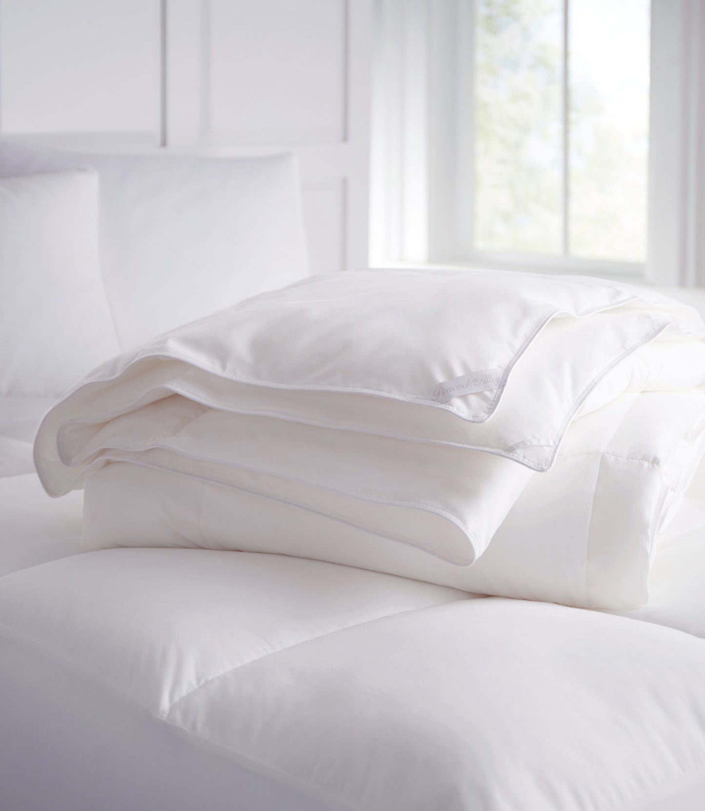 Down Alternative Duvet folded on bed, White