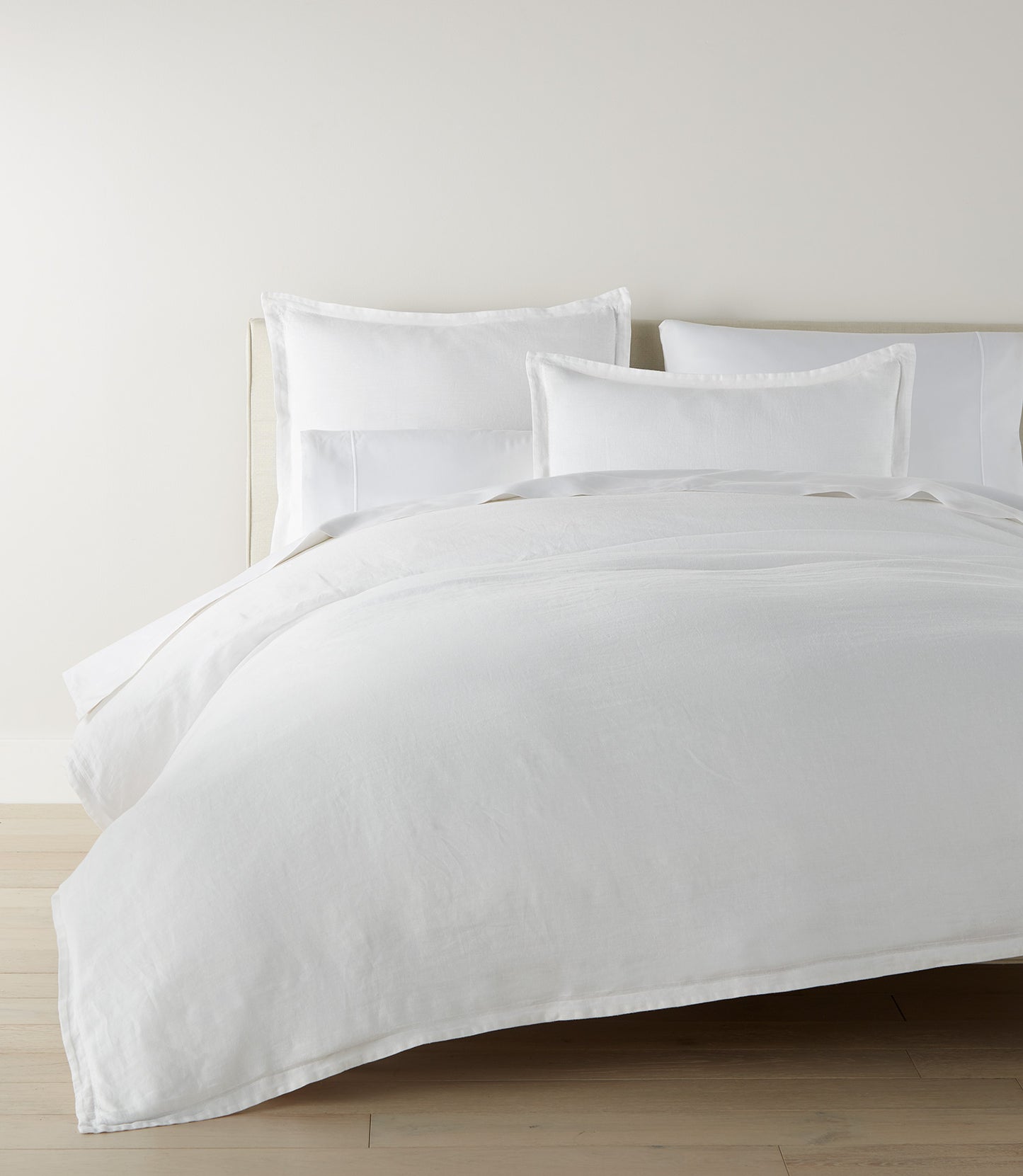 European Washed Linen Shams on bed with duvet, White