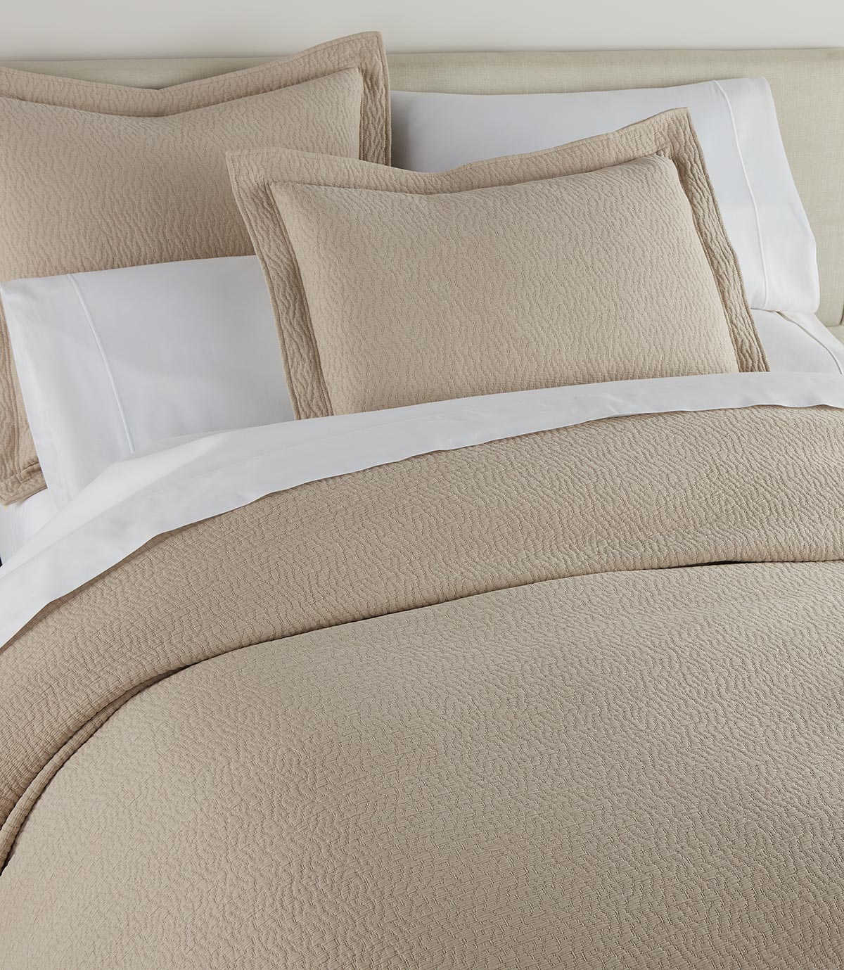 Mia Stonewashed Matelassé Shams on bed, Dune