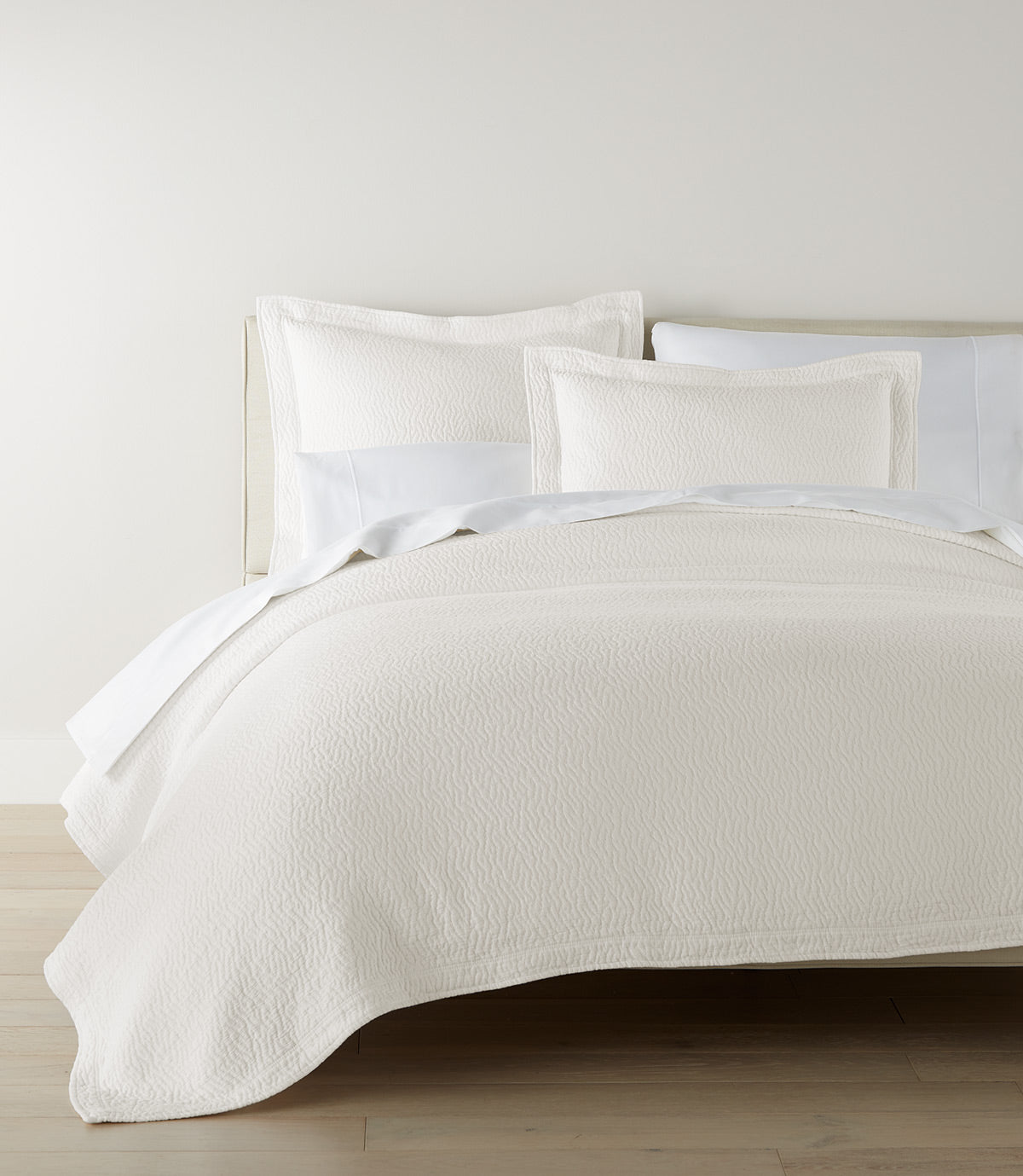 Mia Matelasse Coverlet on bed, Pearl