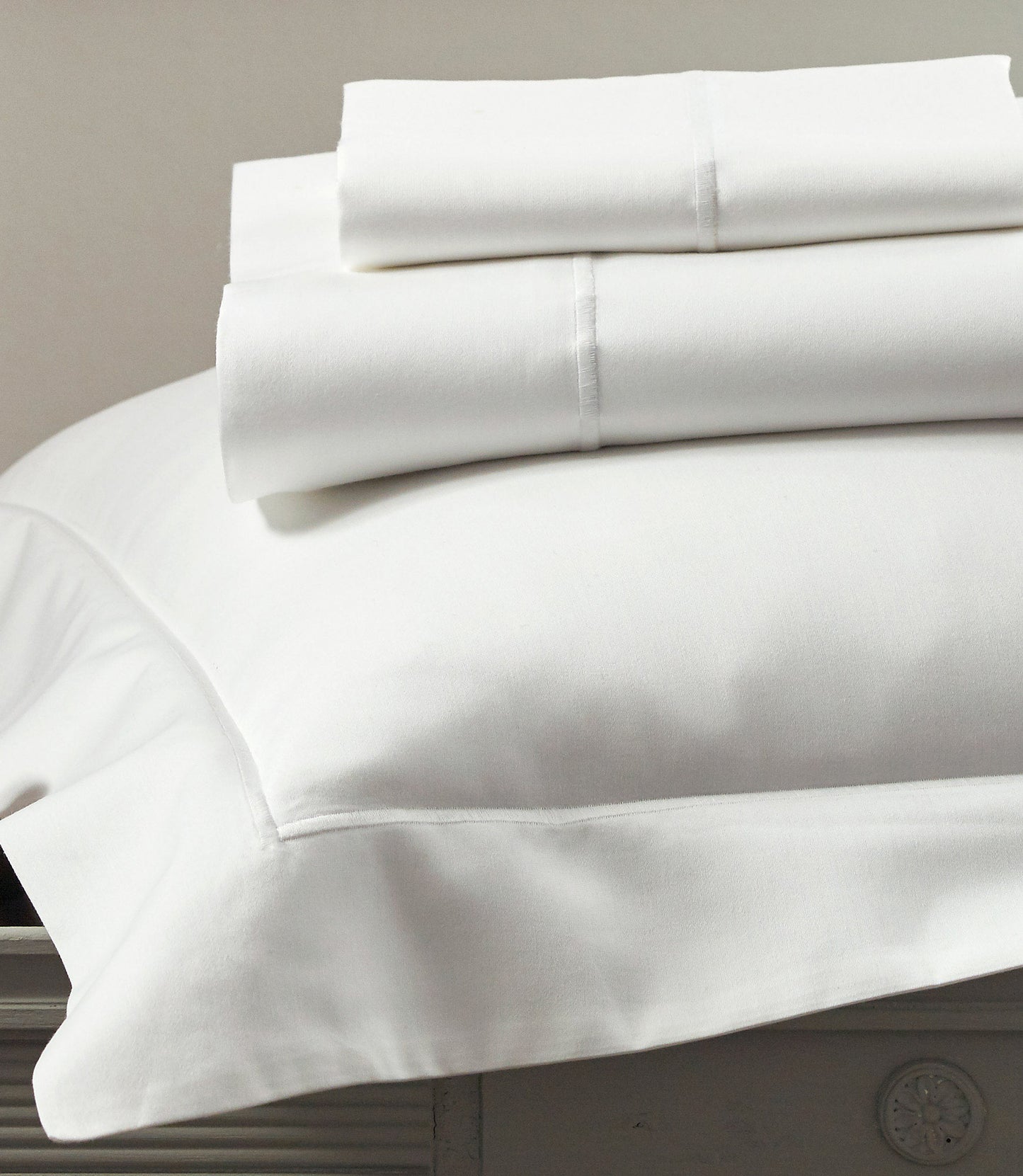 Soprano sham and pillowcases stacked, White