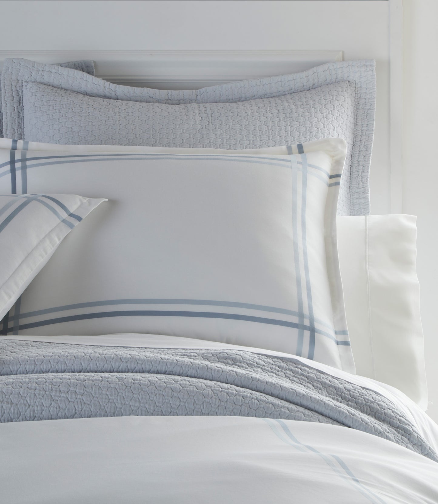Duo Duvet and Shams Blue on Bed 