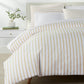 ribbon stripe percale Honey duvet cover on a bed in bedroom