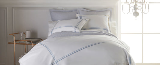 Juliet Shams and Coverlet with Duo Stripe Shams and Duvet Cover on bed | Peacock Alley