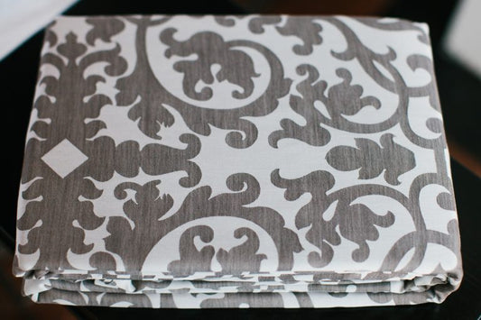 Close up of the Ella Duvet Set from Peacock Alley, with a bold mocha pattern