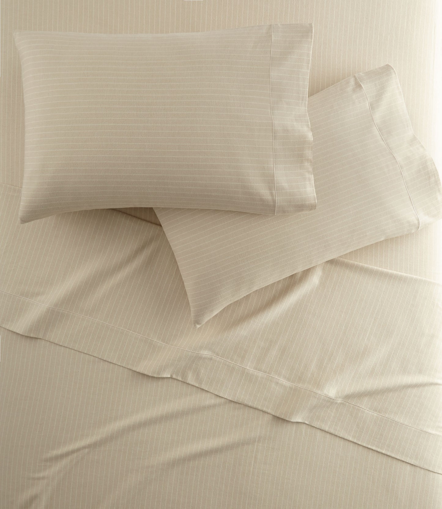 All Seasons Brushed Sheet Set on a bed, Linen