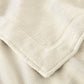 Close up of framing detail of All Seasons Framed Cotton Blanket, Natural