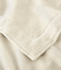 Close up of framing detail of All Seasons Framed Cotton Blanket, Natural