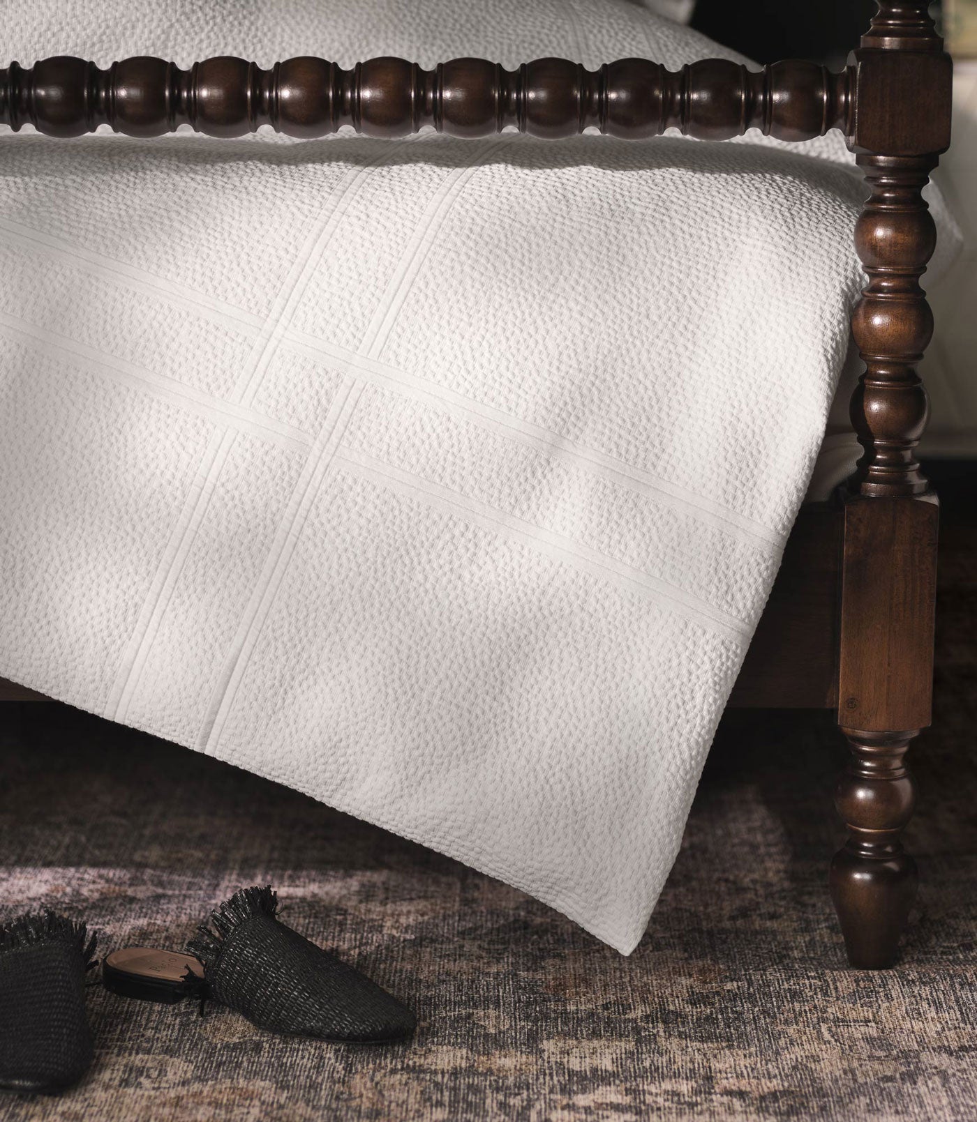 border design on Montauk duvet cover on bed, White