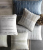 carol benson cobb pillow collection on  gray table