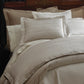 Biagio Duvet Cover and Shams on bed, Pearl
