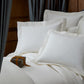 Boutique percale flat sheet on bed, Ivory