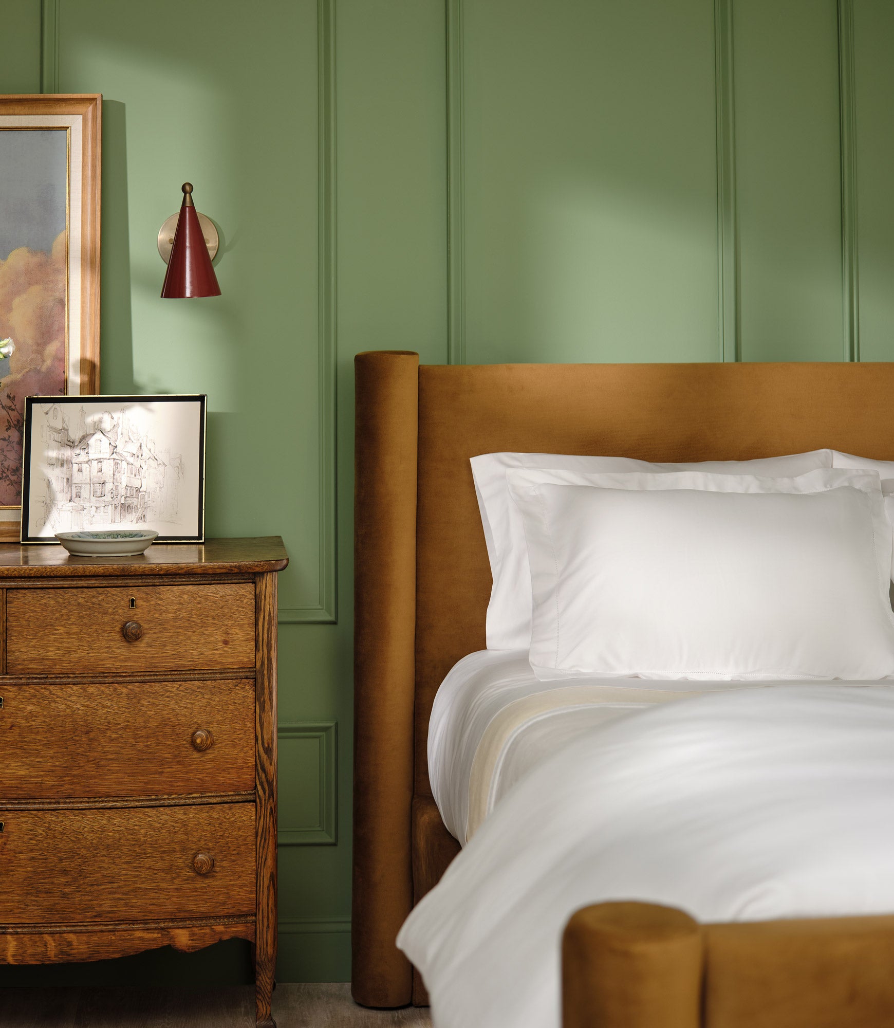 Clara cotton duvet set on bed in green room, White