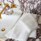 Chelsea hand towels and wash cloth on bathroom vanity, White