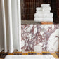 Tiffany bath rug by bath tub, White