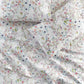 Chloe percale floral print pillowcases and sheets on a bed, Floral