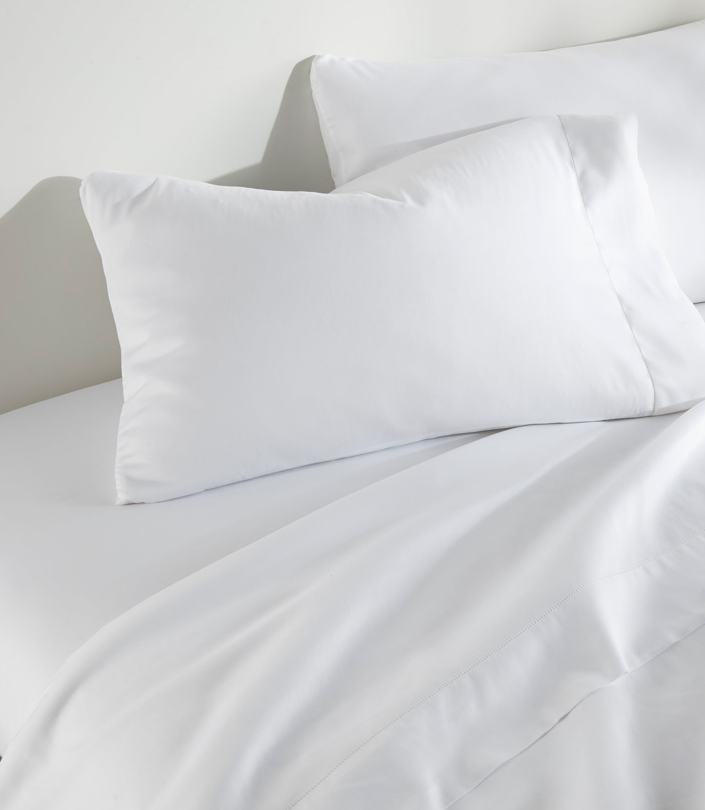 Clara Sateen Sheet Set on bed, White