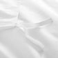 Close-up of a white duvet cover ties