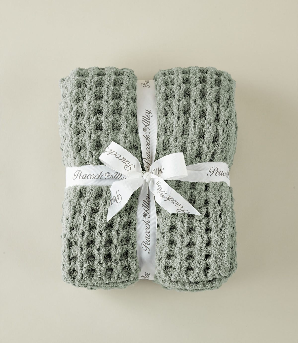 Cozy Waffle Throw wrapped in white ribbon tie, Sage