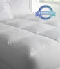 Down alternative mattress topper and mattress cushion on a bed, White