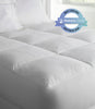 Down alternative mattress topper and mattress cushion on a bed, White