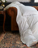 down alternative duvet across a couch down category