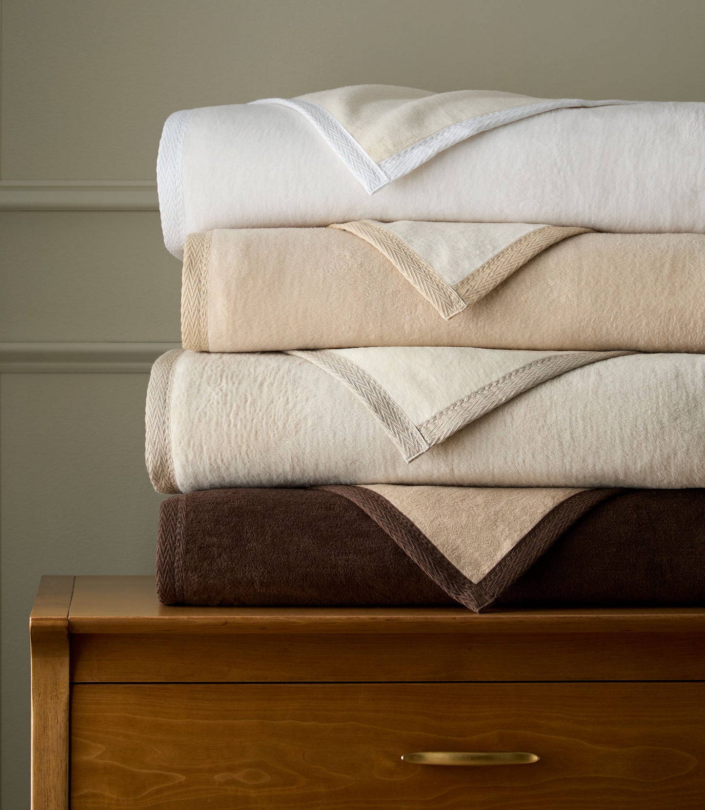 Favorite Reversible Cotton Blanket Stack on a dresser White Linen Flint Chocolate
