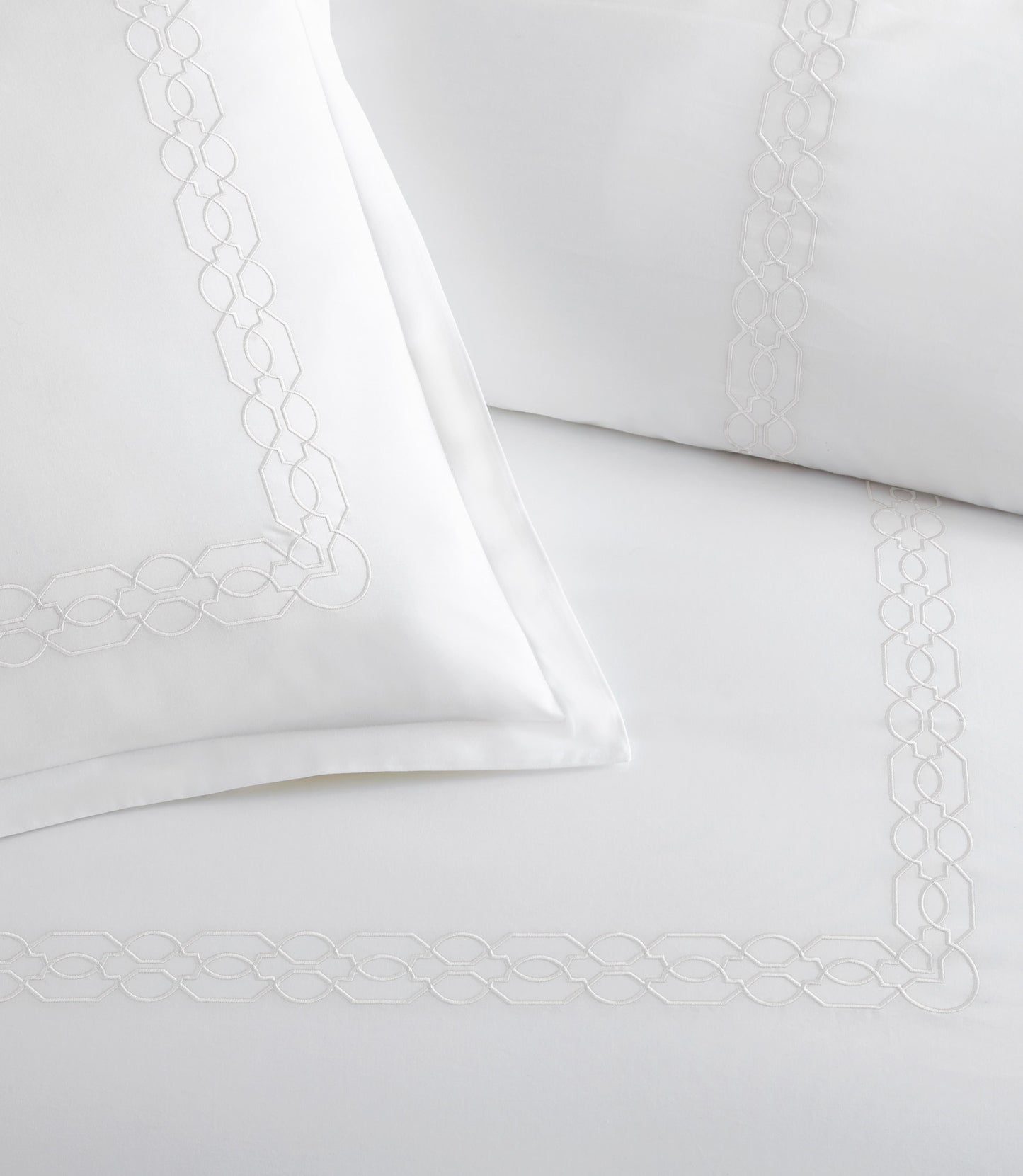 Close up of border detailing on Filigree Classic Embroidered Duvet Set, White