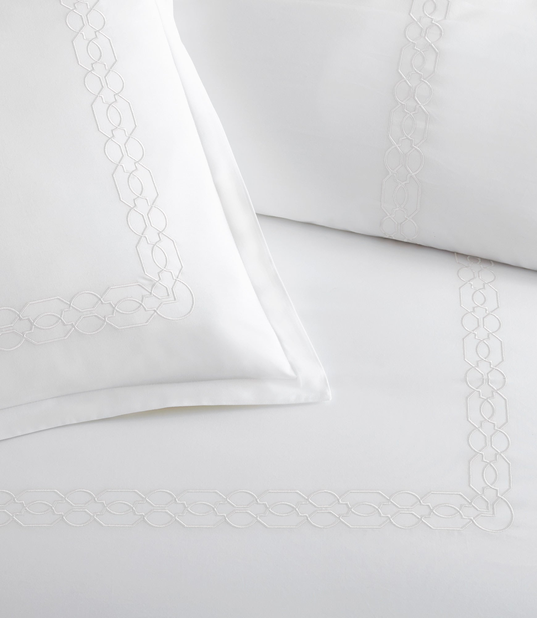 Close up of border detailing on Filigree Classic Embroidered Duvet Set, White