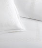Close up of border detailing on Filigree Classic Embroidered Duvet Set, White