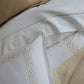Close-up border detailing on Filigree Classic Embroidered Duvet Set in Linen.