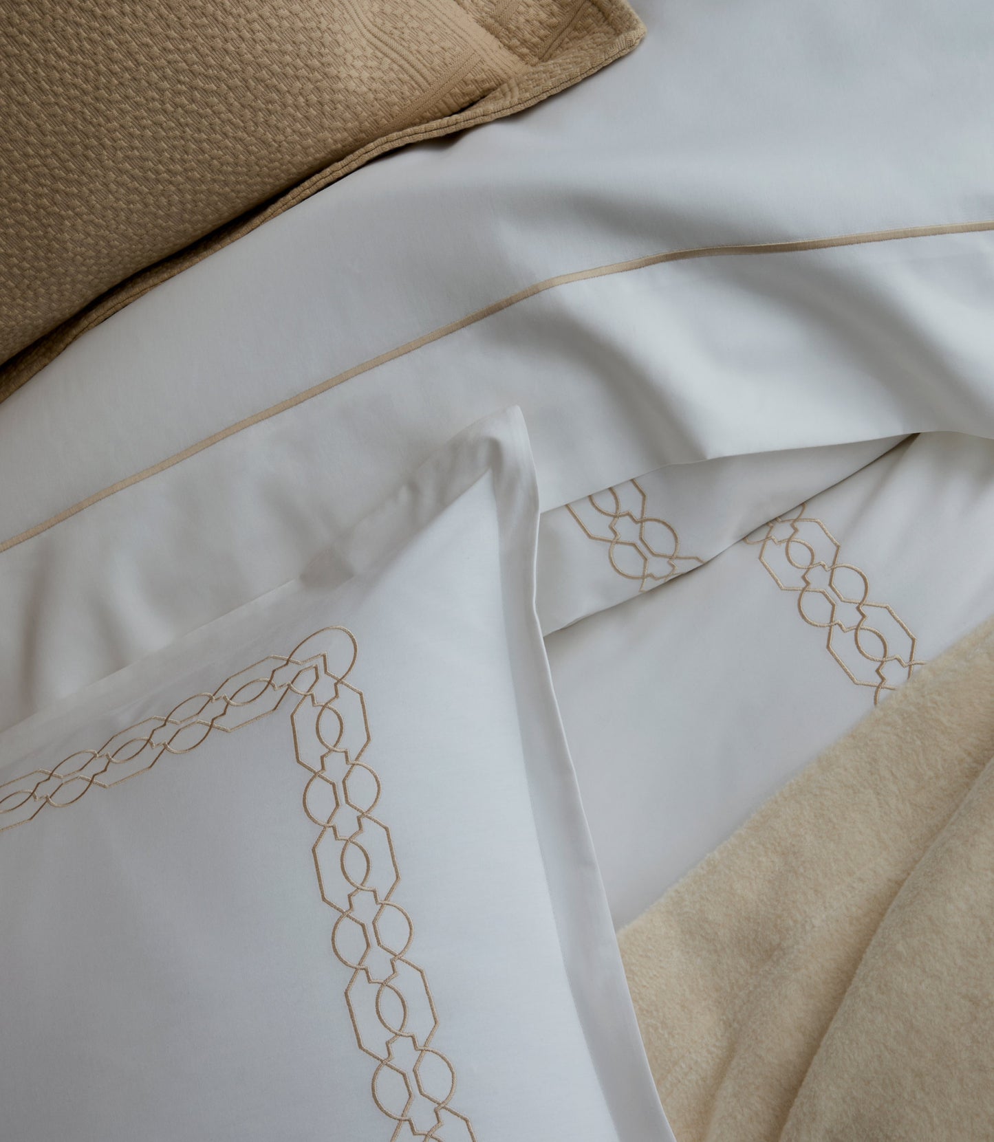 Close-up border detailing on Filigree Classic Embroidered Duvet Set in Linen.