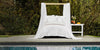 white canopy bed outside by pool