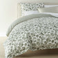 Highgrove Toile Reversible Duvet Set, Highgrove Moss displayed on a bed