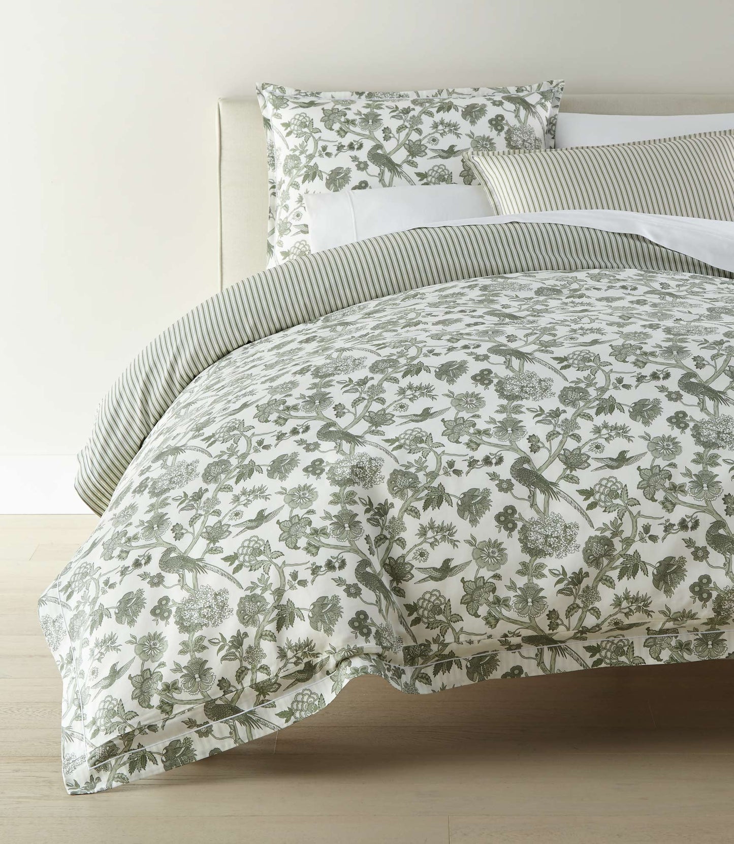 Highgrove Toile Reversible Duvet Set, Highgrove Moss displayed on a bed