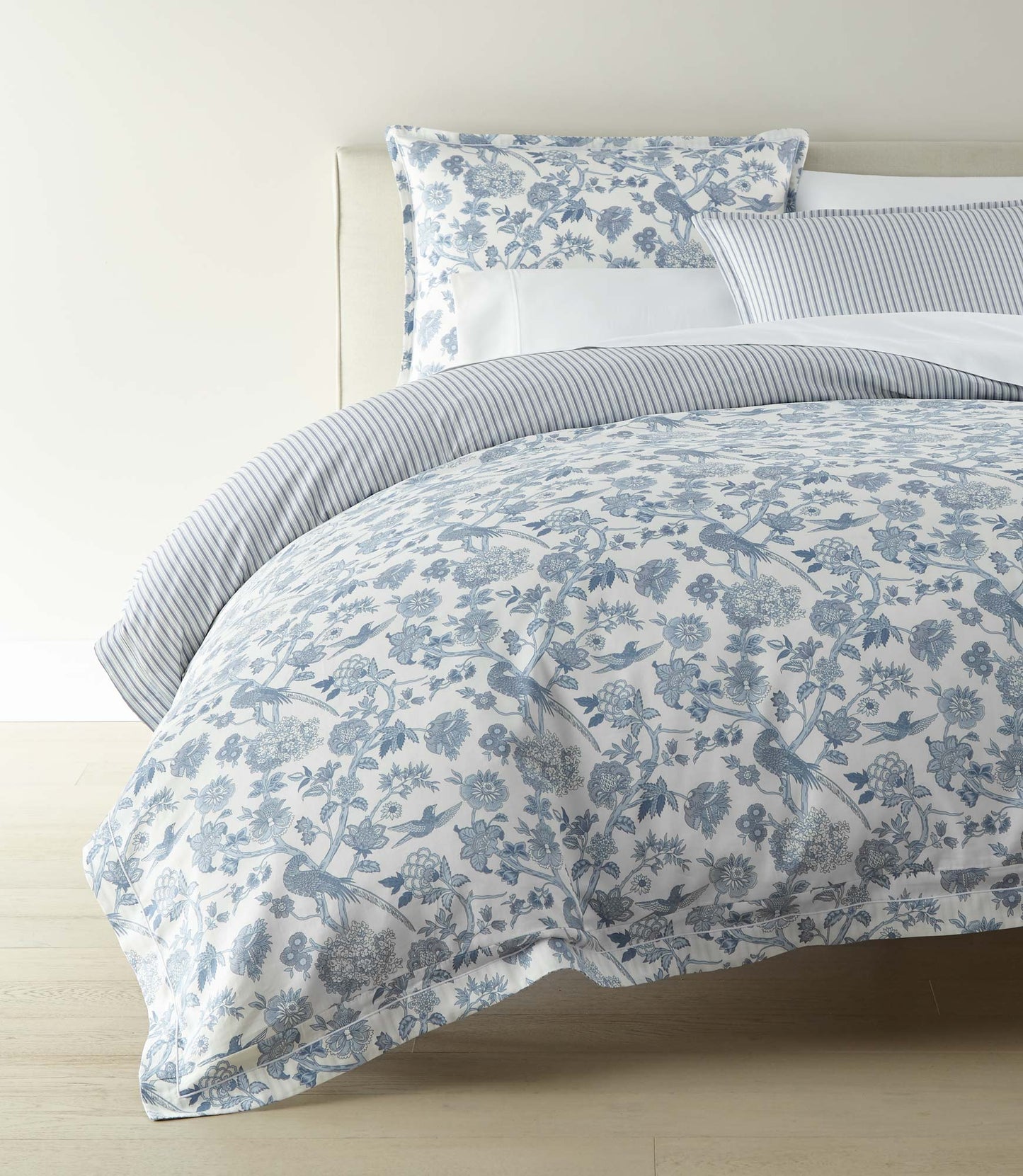 Highgrove Toile Reversible Duvet Set, Highgrove Wedgewood displayed on a bed