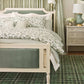 Highgrove Toile Reversible Duvet Set displayed on a green bed, plaid rug and decorative curtains, Highgrove Moss