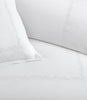 Close up of vine detailing on the Ivy Classic Embroidered Duvet Set, White