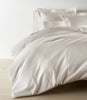 Lyric Duvet Cover and Shams on Bed in Platinum