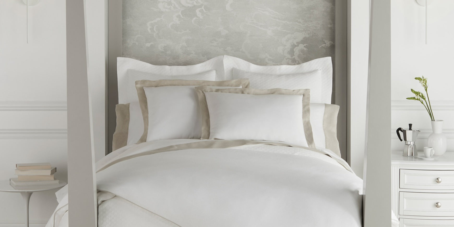 
Mandalay Cuff Duvet Cover and Shams on a white canopy bed
