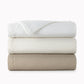 stack of Mia Coverlets in neutral colors, White Dune Pearl