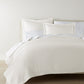 Mia Matelasse Coverlet on bed, Pearl