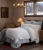 Montauk Coverlet in Barely Blue and Boutique Percale Duvet Cover in Linen