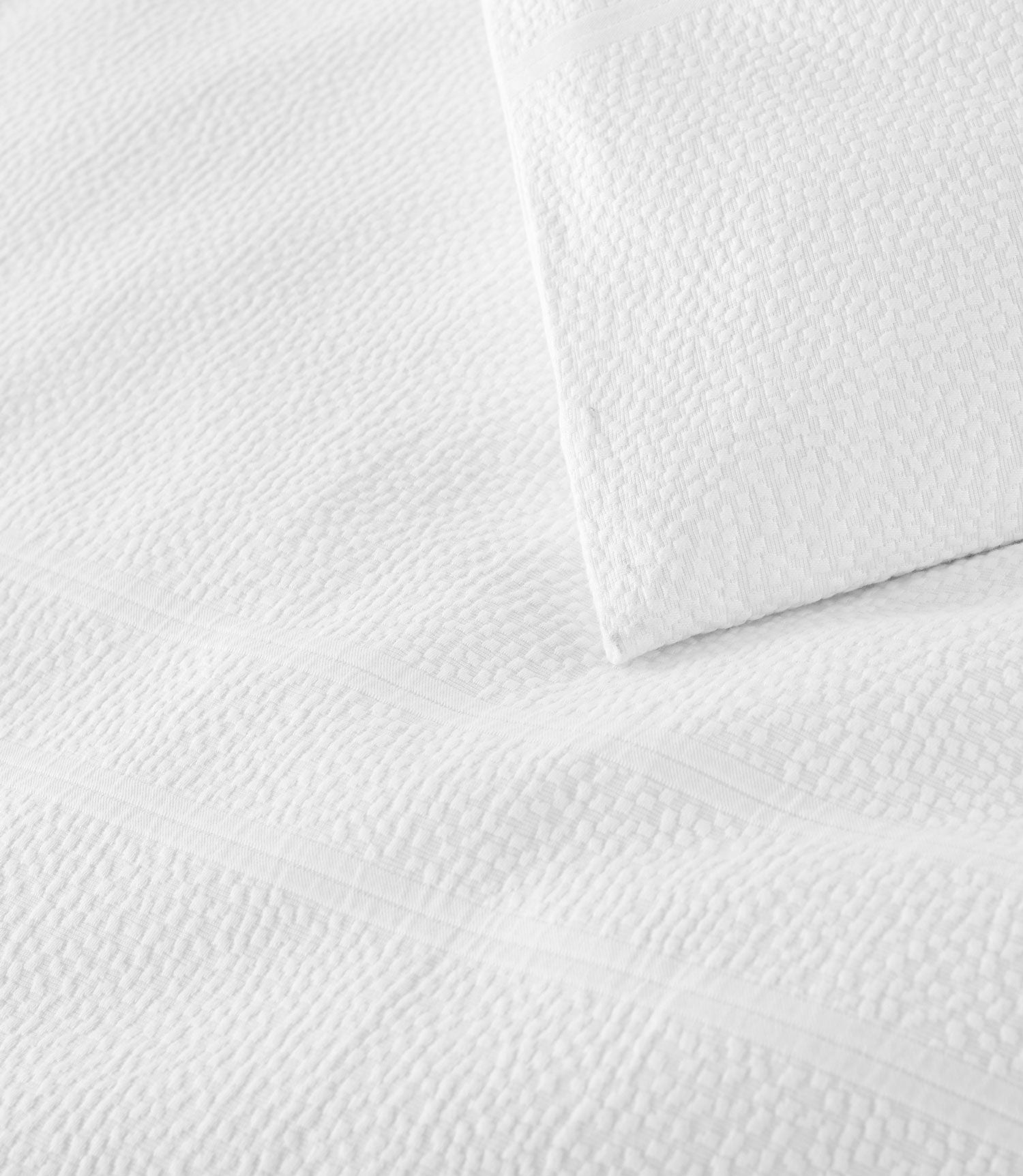 corner and border design details on Montauk duvet cover, White