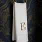 Special Occasion hand towel hanging on towel loop, White