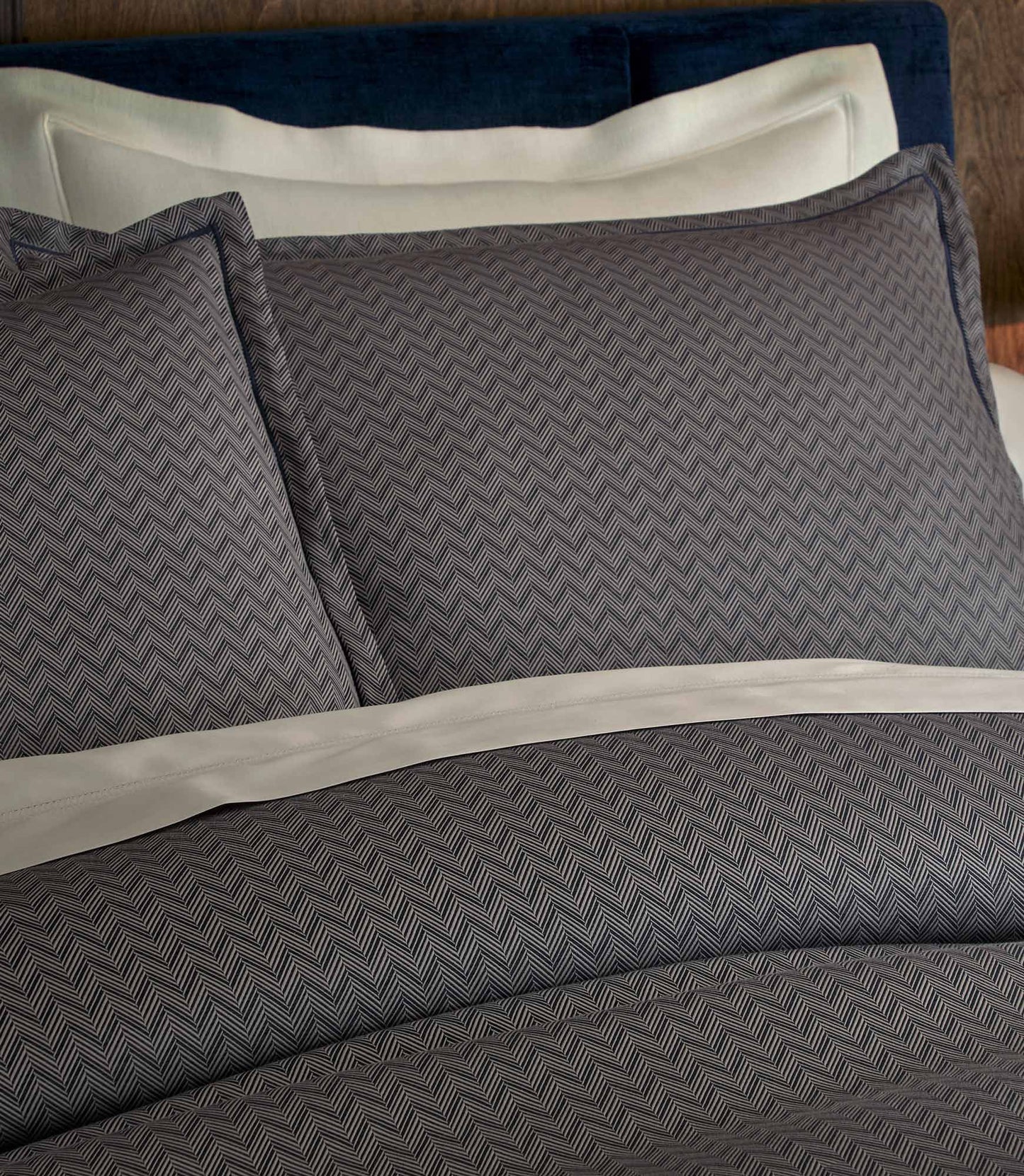 Savoy Jacquard Duvet Set in Navy styled with neutral color sheets