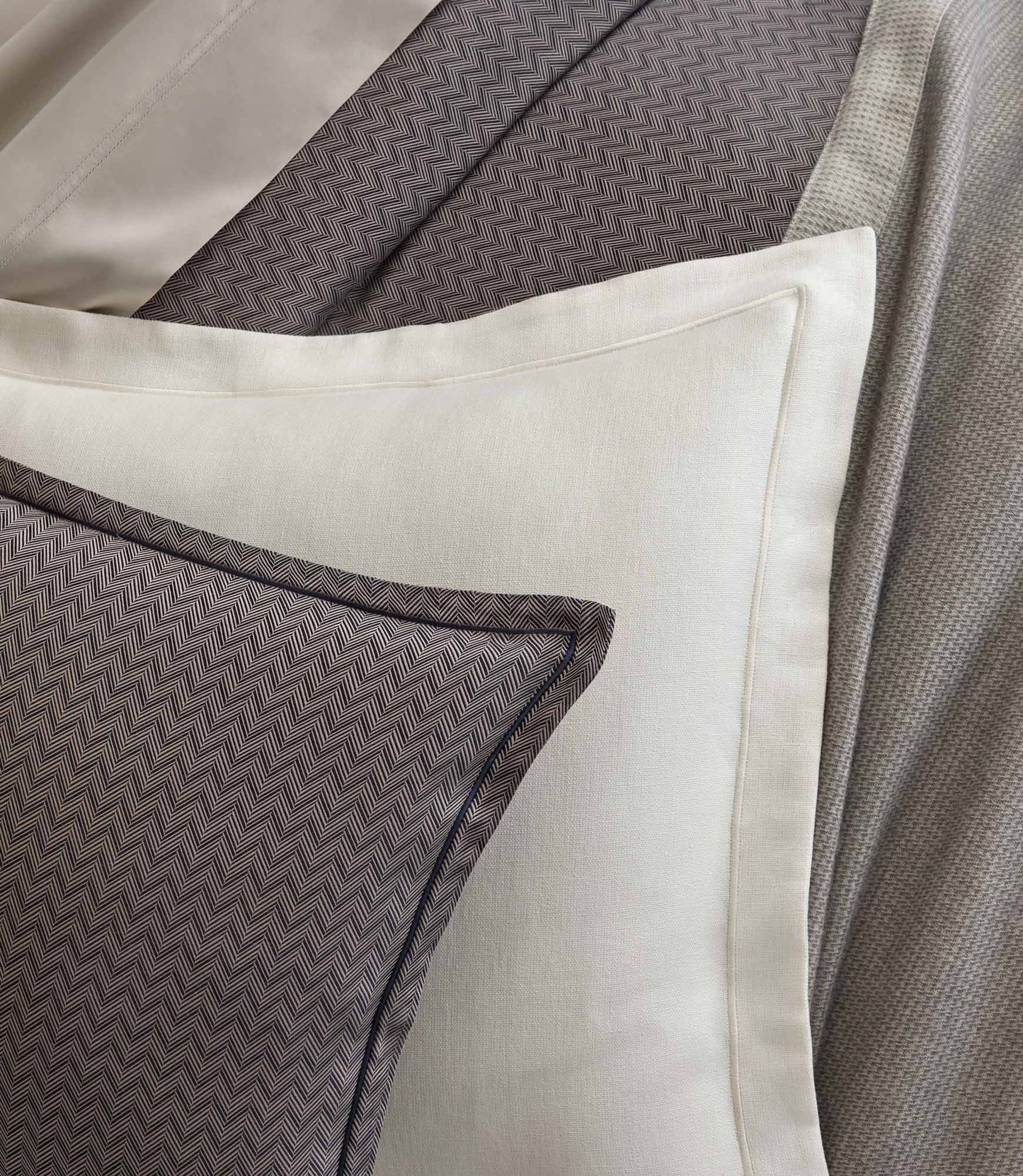Close-up of Savoy Jacquard Shams style on a bed, Navy